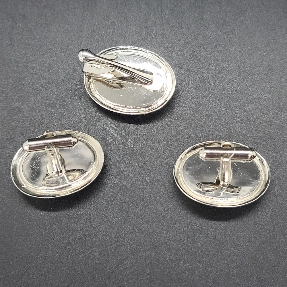 Cufflinks and Tie Clip. 6 Shooter.